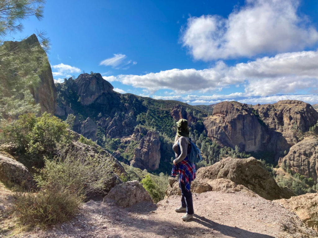 Hiker looks out over beautiful landscape of Pinnacles National Park