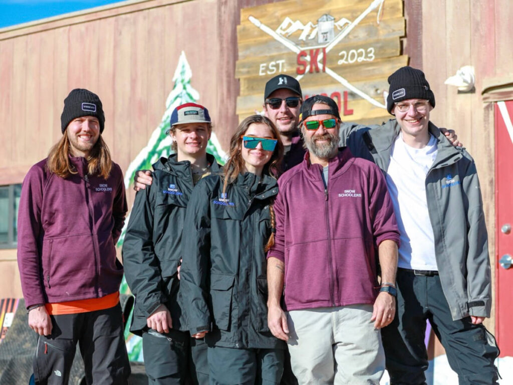 Ski instructors smiling for a photo in Hoedown Hill