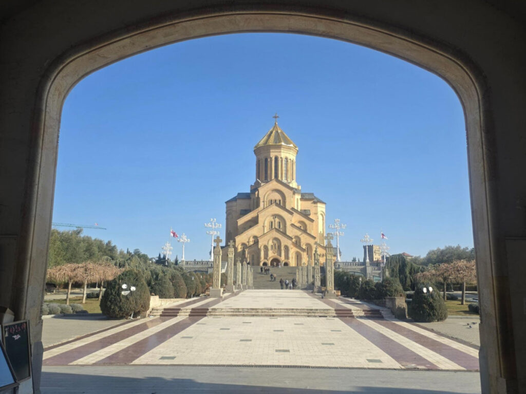 View of the Holy Trinity Cathedral from the archway in Tbilisi