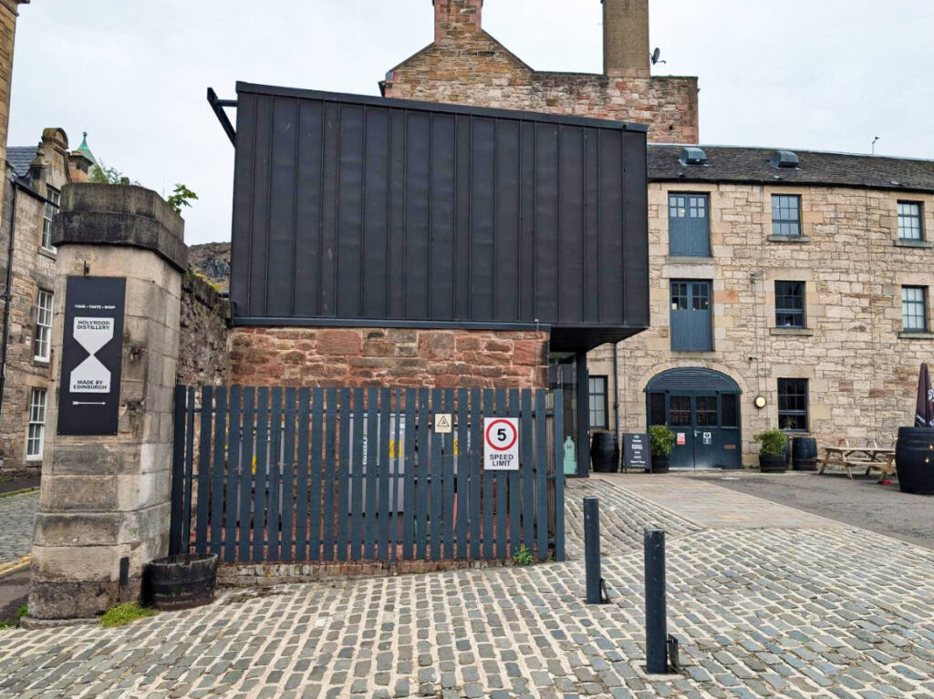 View of the brick walled exterior of Holyrood Distillery