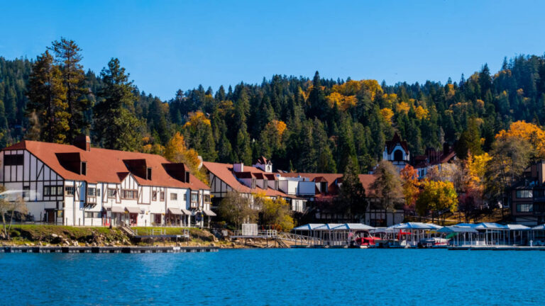 View of the homes in Lake Arrowhead surrounded by fall foliage in Autumn