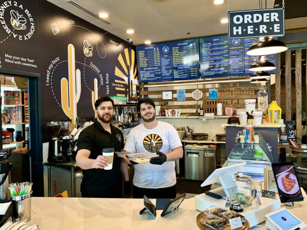 The staff of Honey 2 A Bee at the counter
