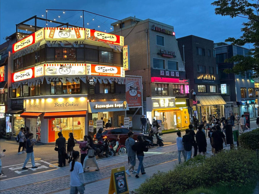 View of people roaming around Hongdae streets at night