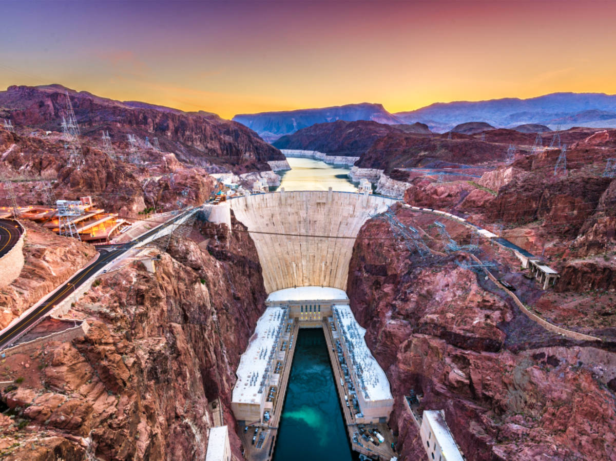 Magnificent aerial view of the Hoover Dam and Colorado River at sunset