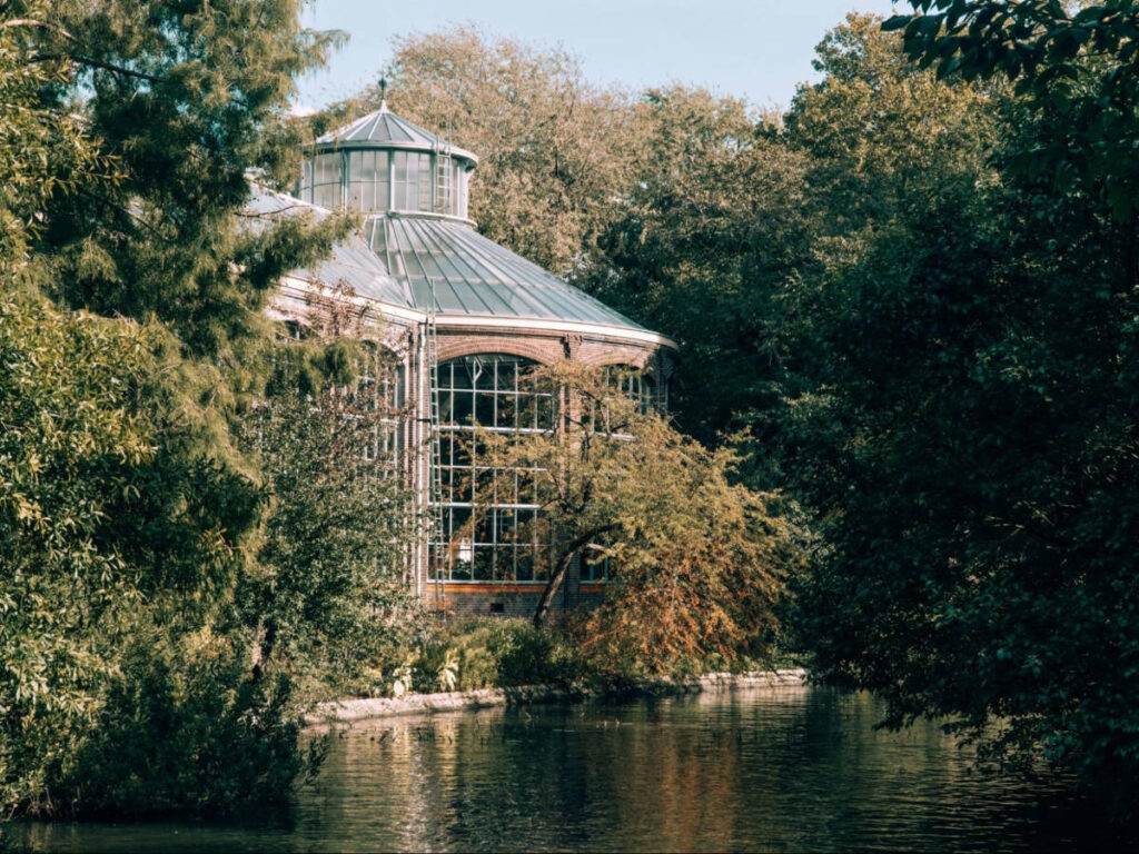 View of the greenhouse overlooking the pond in Hortus Botanicus