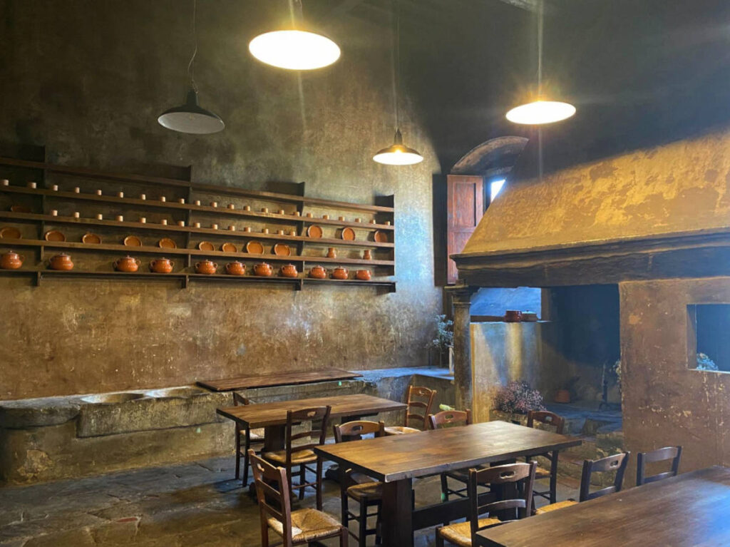 Tables and chairs on a hostel communal space