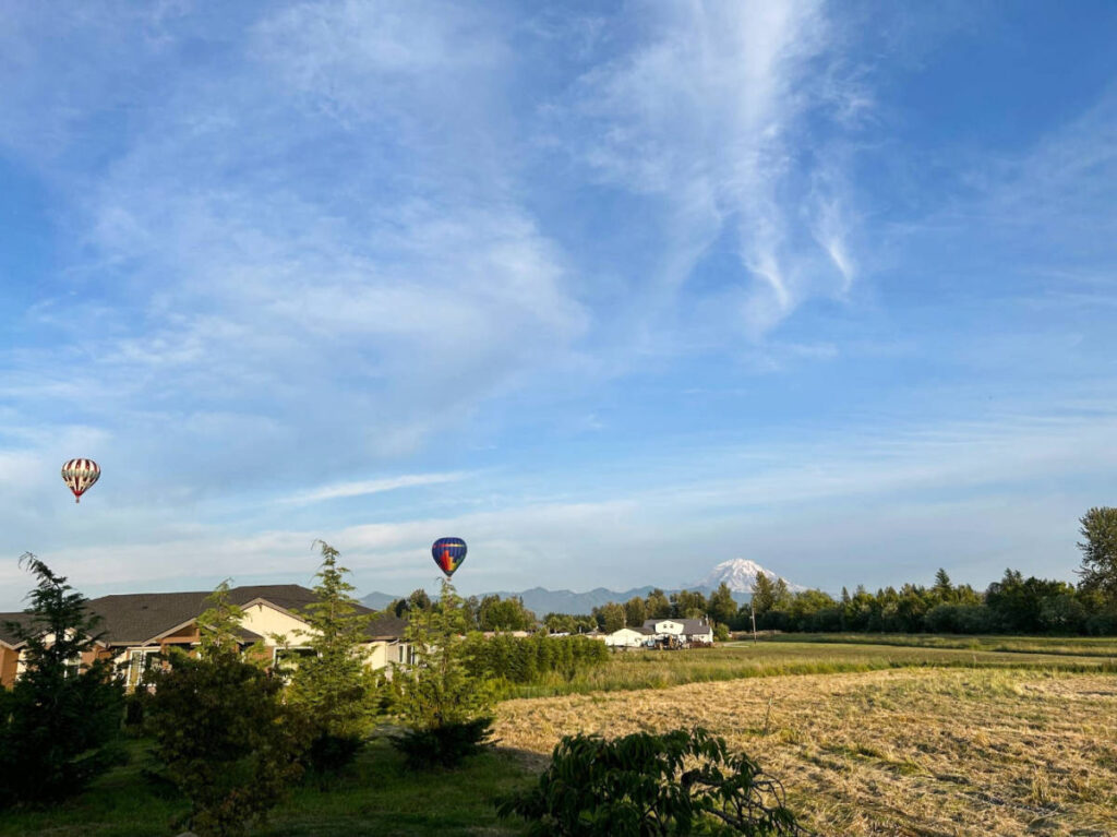 Colorful hot air balloons floating in the sky of Enumclaw