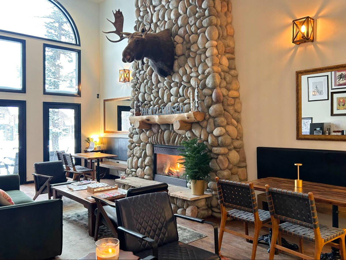 A fireplace in the cozy lobby of Hotel Frisco
