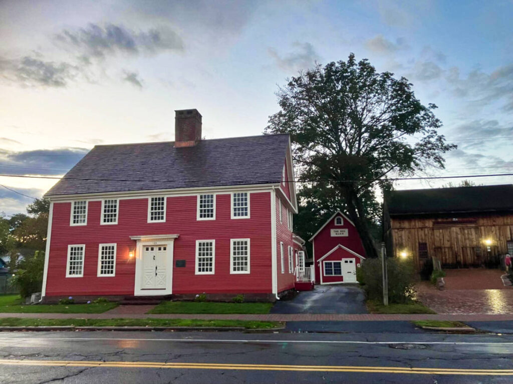A big red house along the main street in Old Wethersfield