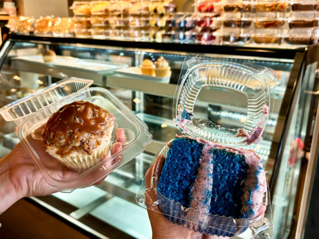 A praline cheesecake cupcake and blue magic layer cake from Hunnie Butter