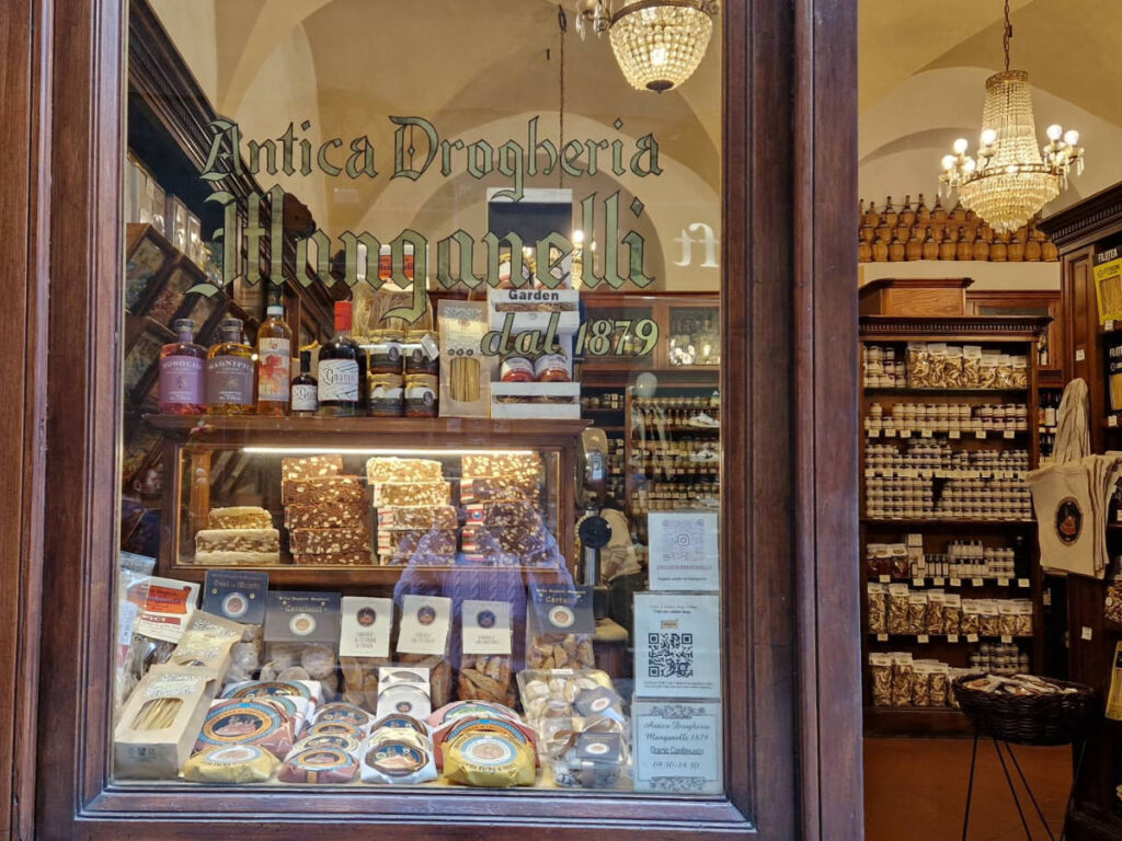 View of the displayed pastries and sweets from the outside of Antica Drogheria Manganelli