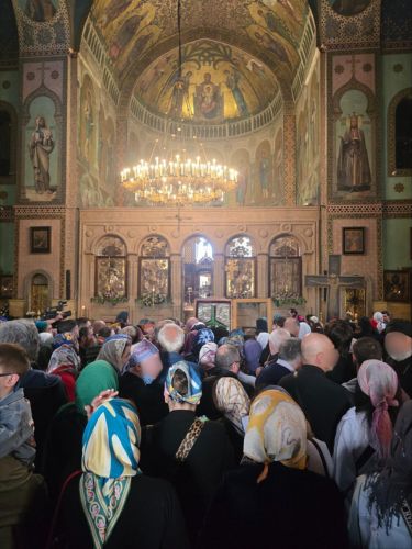 Churchgoers inside Sioni Cathedral with a view of the Georgian sacred arts