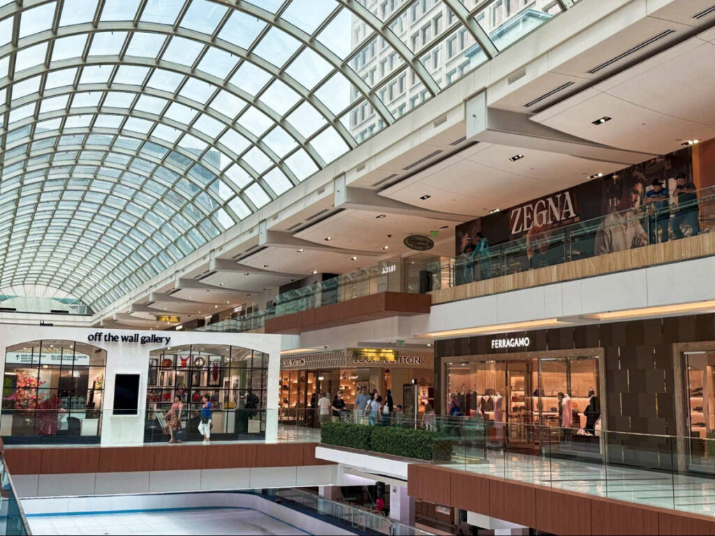 View of the shops and the glass ceiling inside The Galleria