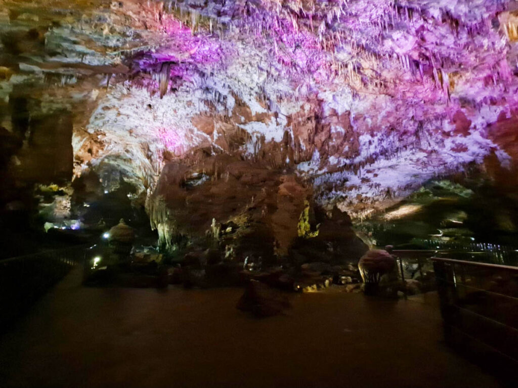 View of the colorful lights inside the Prometheus Cave