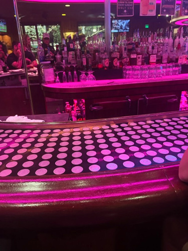 View of the bar counter inside the Silver Dollar Bar & Grill