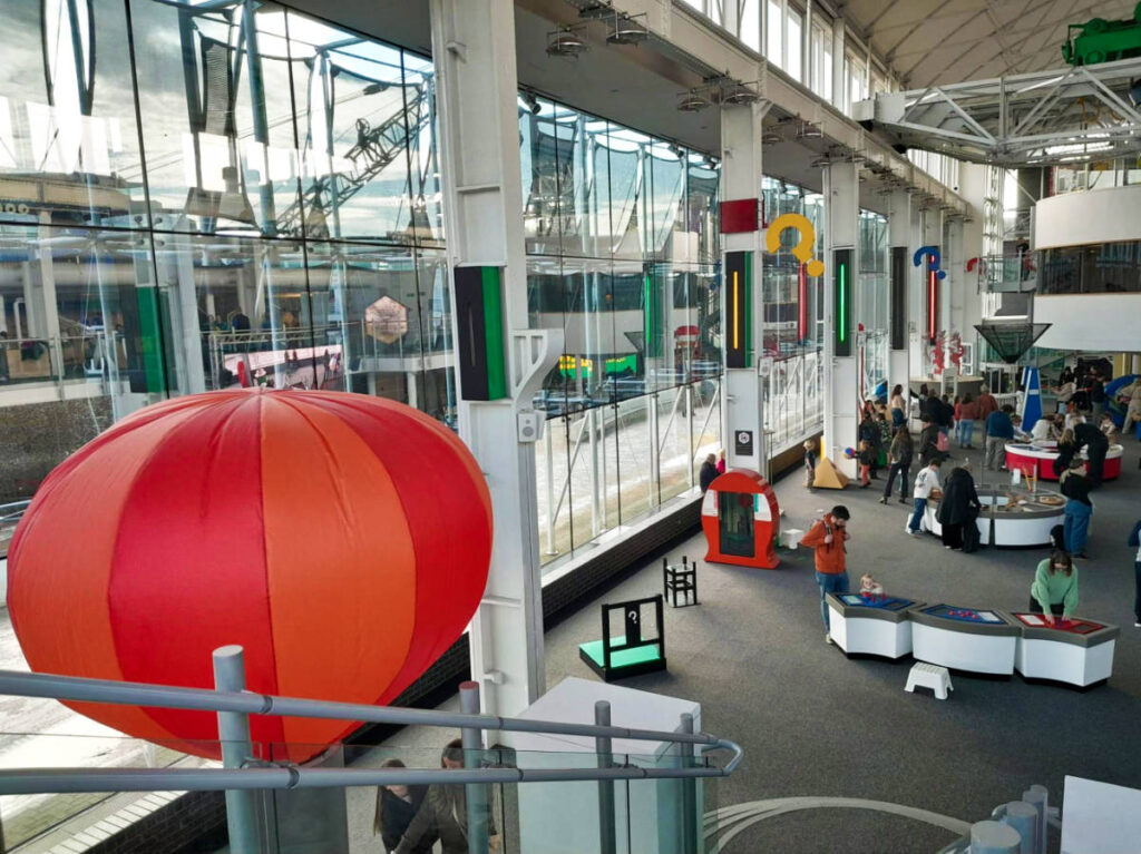 People enjoying the interactive activities inside the Techniquest