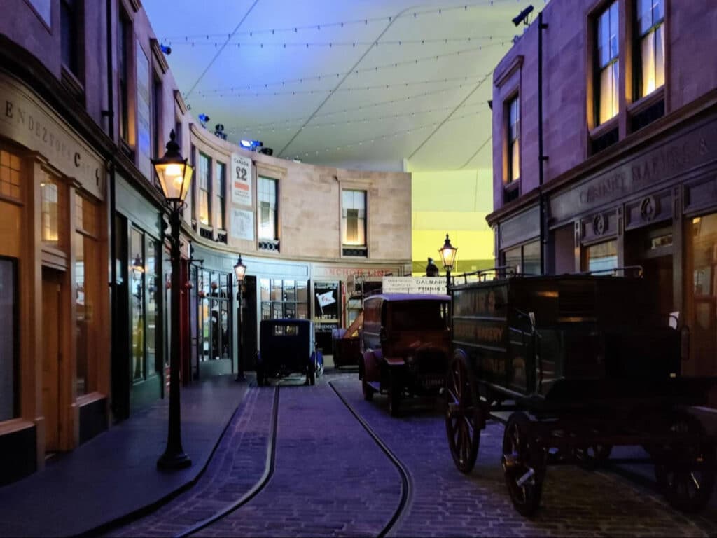 Old vehicles inside the Riverside Museum