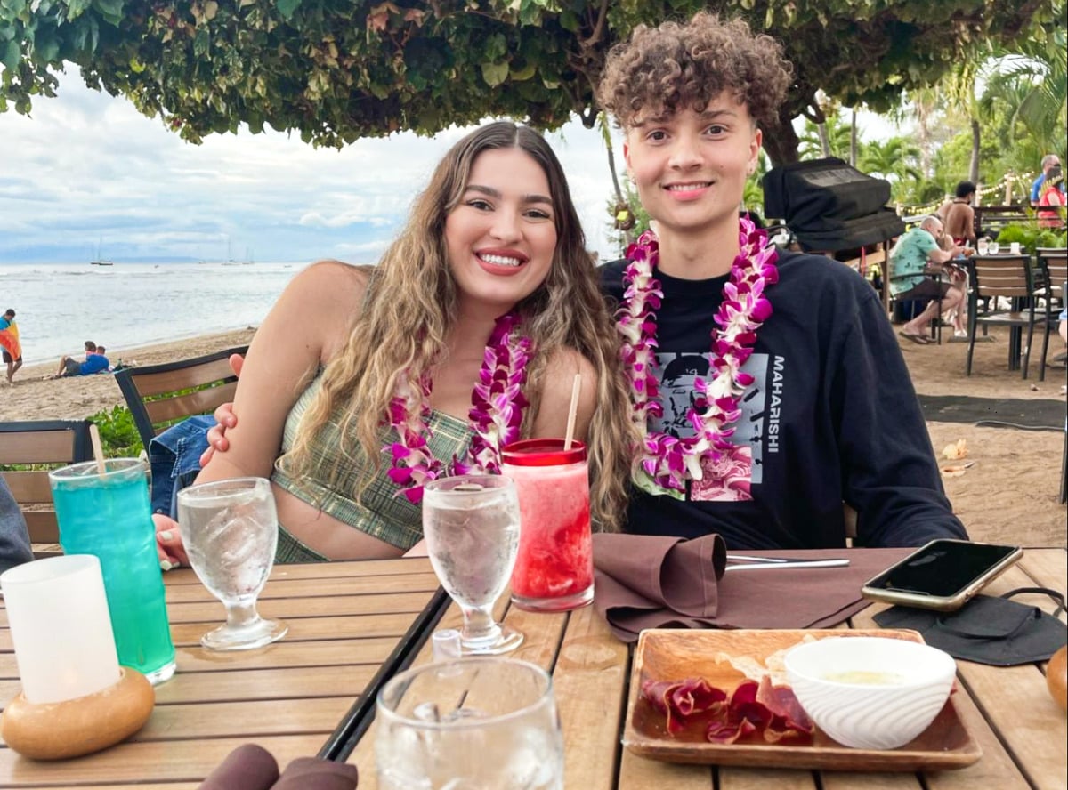 Travel Lemming Writer, Isabelle and her partner at The Feast at Lele Luau