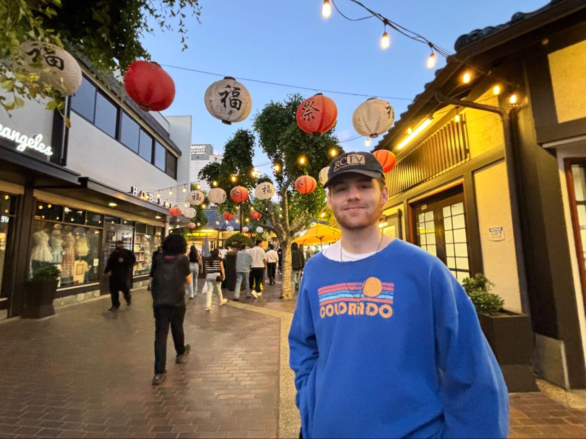 Michael beneath the lanterns in the Japanese Village Plaza