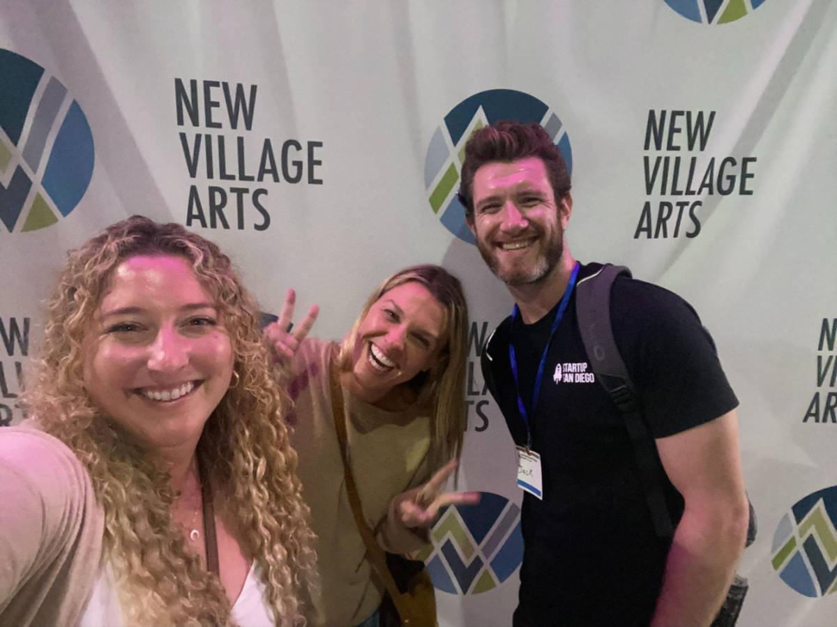 The author Jess Levy and friends posing for a photo outside the Theater