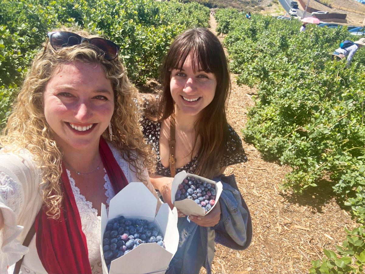 The author Jess Levy and her friend at the Temecula Berry Co.