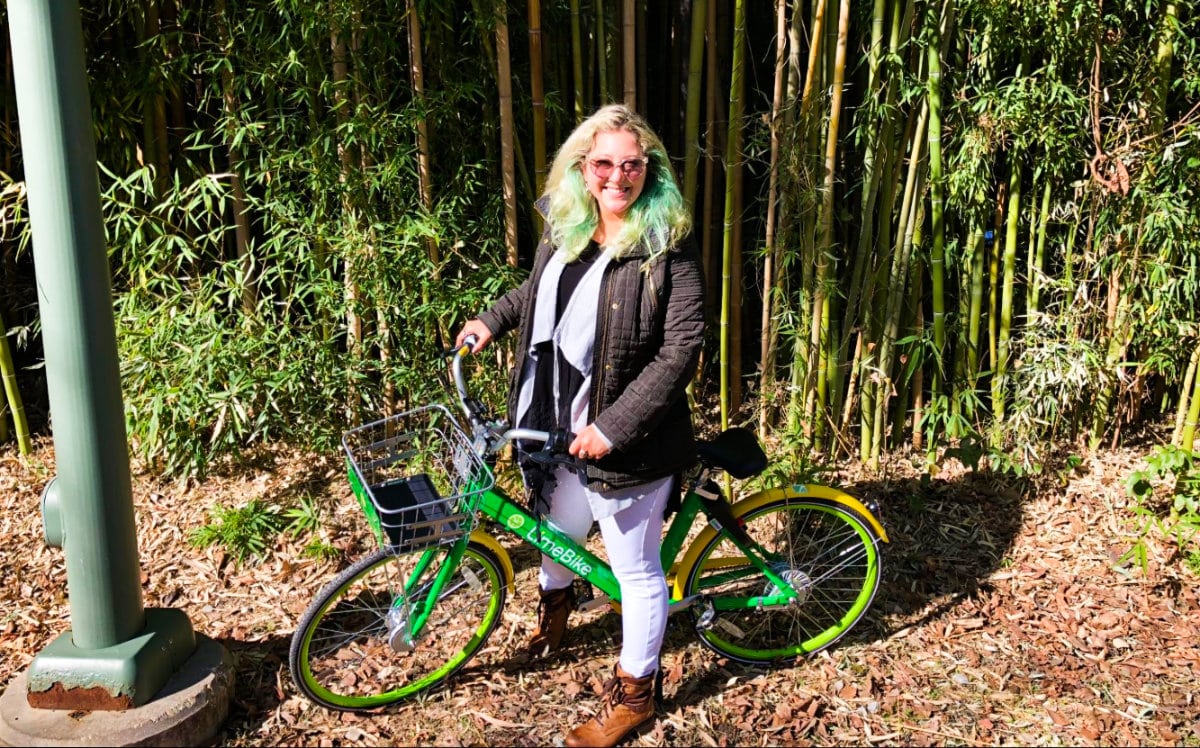 Travel Lemming Writer, Jess posed with her bicycle at the Katy Trail