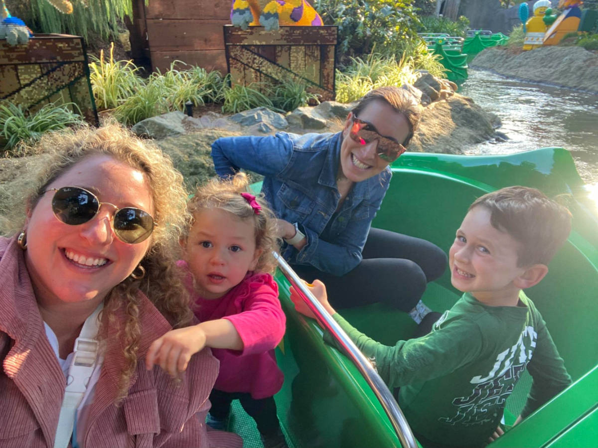 Author Jess and her family on the ride at Legoland’s Dino Valley