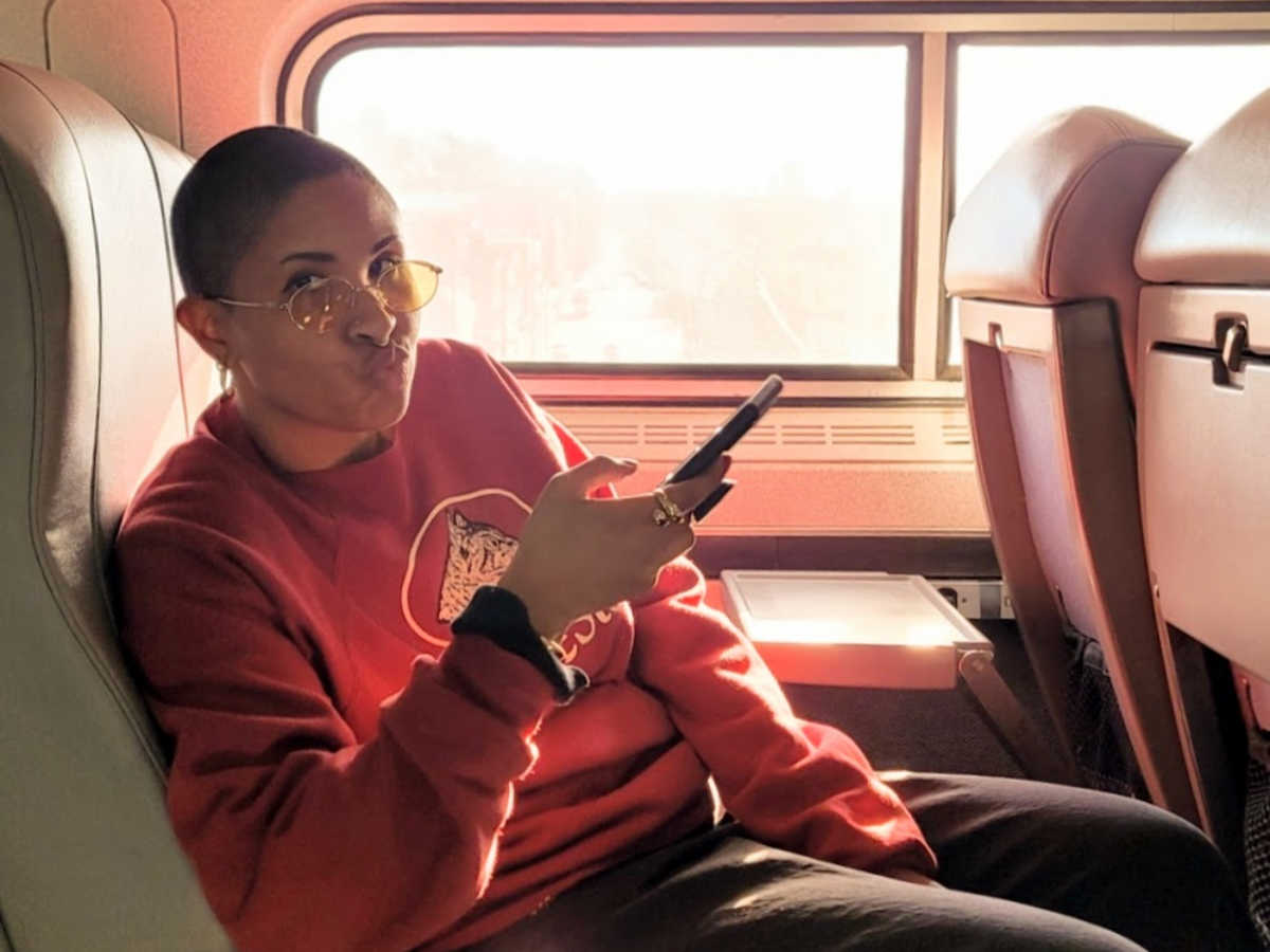The author, Jonaye Barnum, posing for a photo inside the train