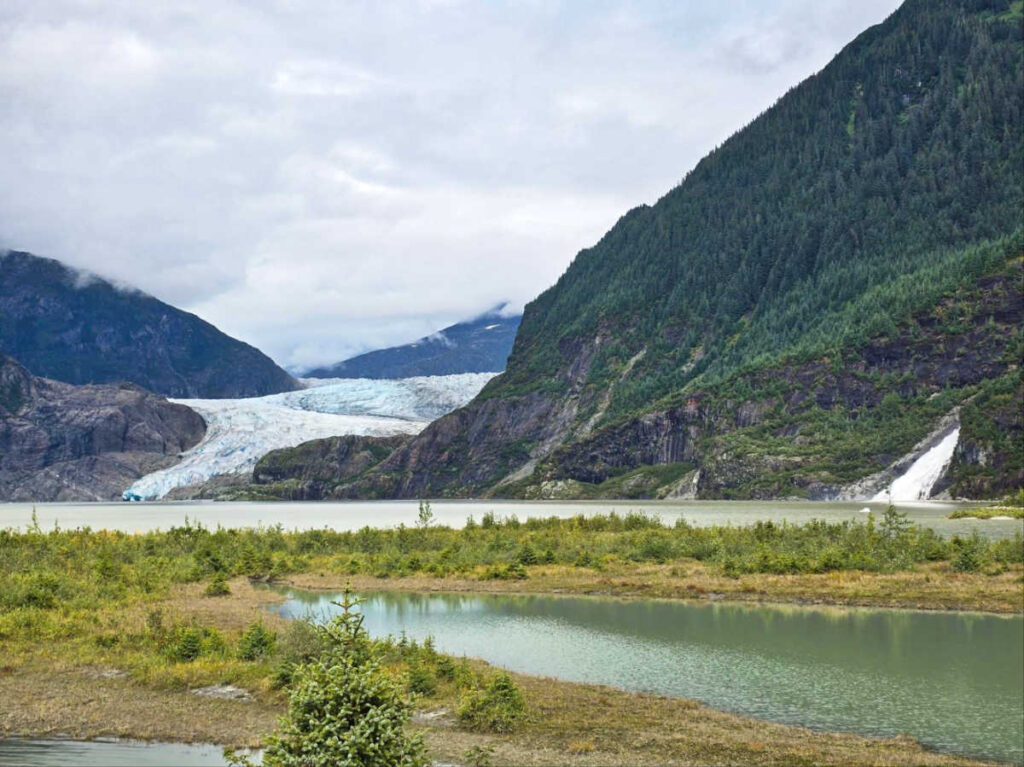 Scenic view of the glacier in the middle of the mountain