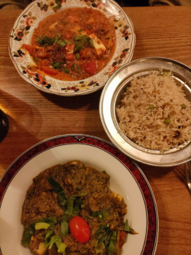 Plates of Kadai paneer and saag tikka paneer served in Mother India
