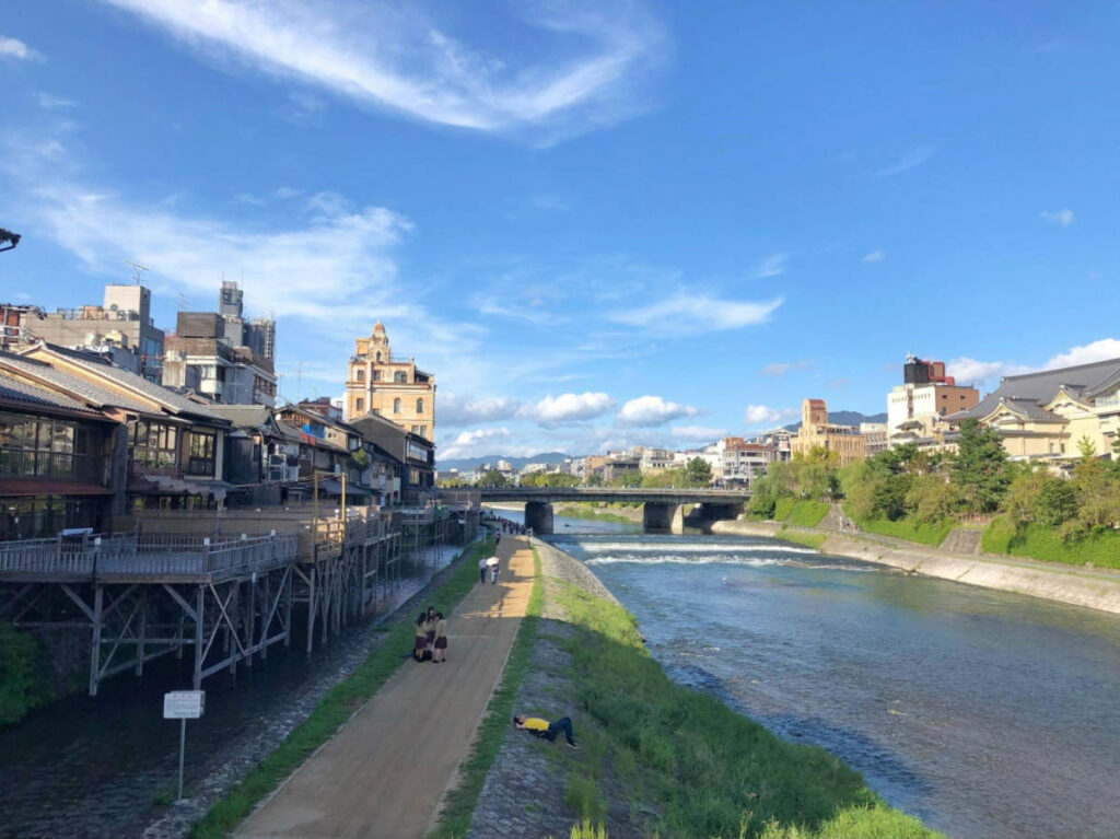 Overlooking view of the local relaxing along the Kamo River