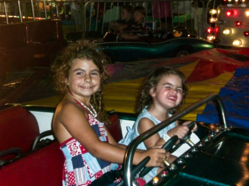 The author's daughter and granddaughter on the car ride  at Family Kingdom Amusement Park