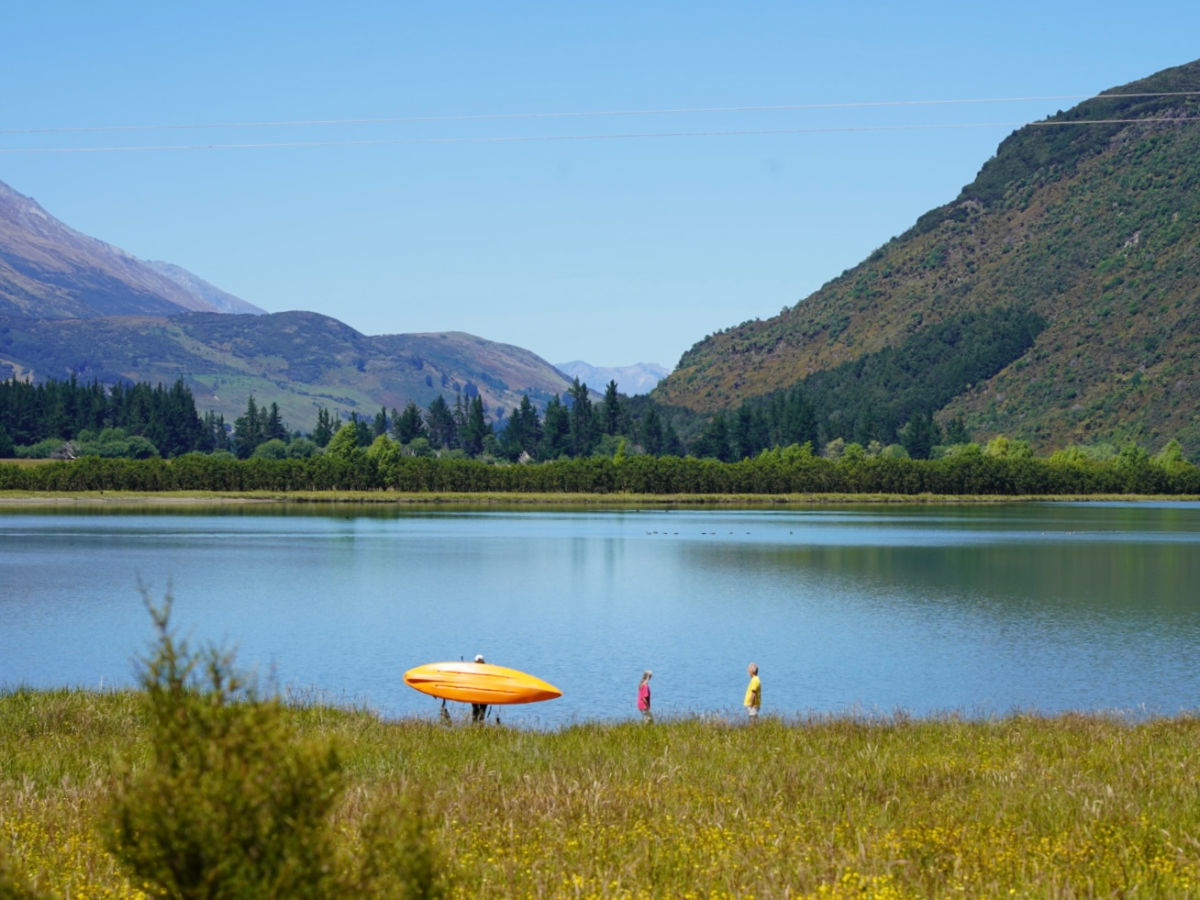 View of Kayakers preparing for a ride down the Rees River