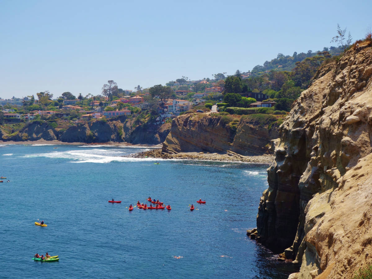 Overlooking view of people enjoying kayaking in La Jolla
