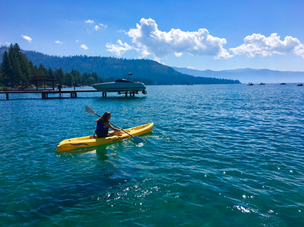Travel Lemming writer Laura McFarland while kayaking on Lake Tahoe