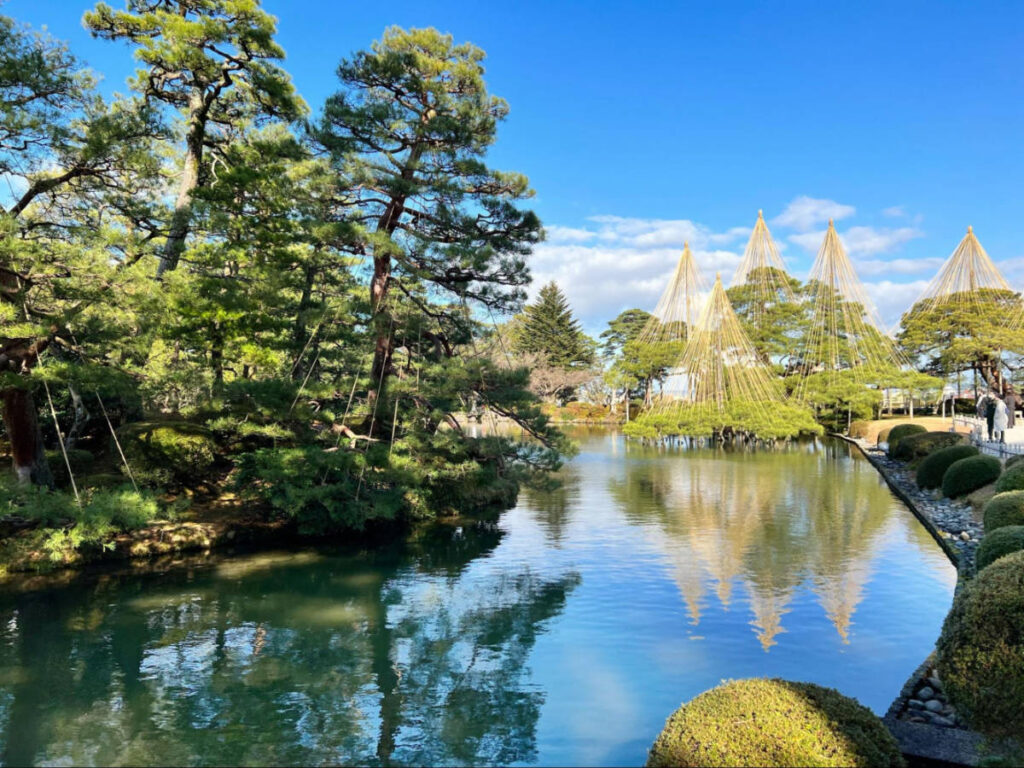 View of the calm waters and greeneries at Kenroku-en Garden