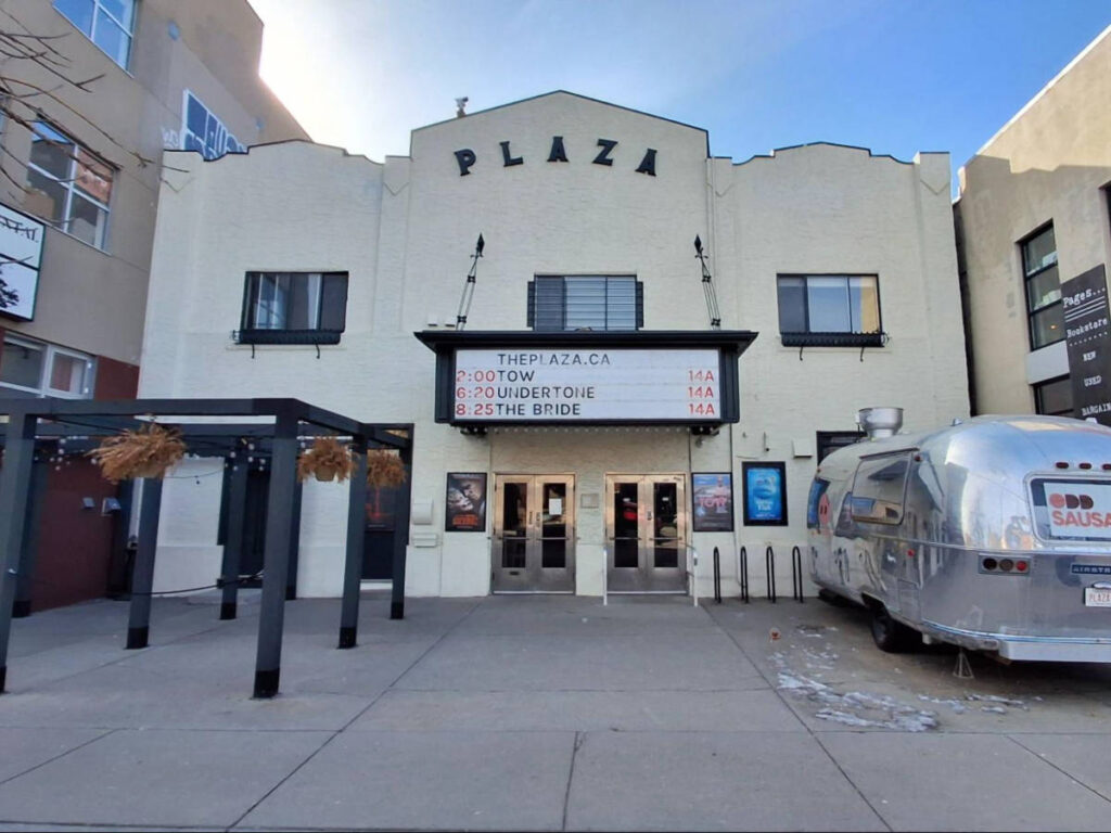 View of the white exterior of Kensington Plaza Theatre