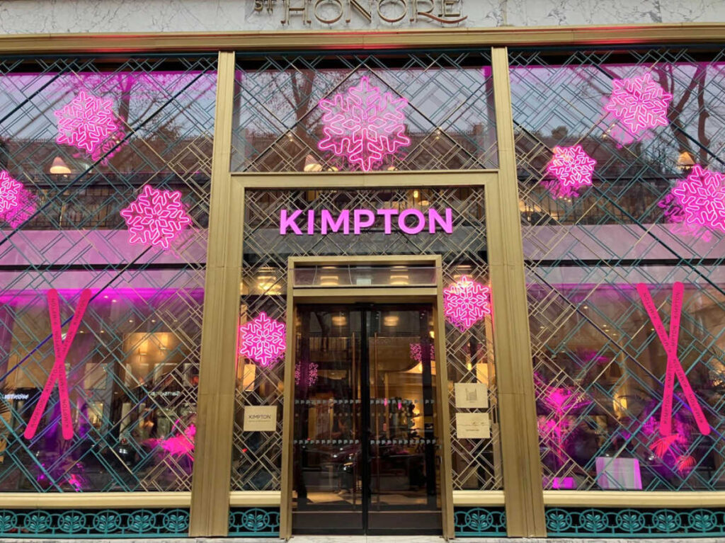 The neon Christmas decorations at the entrance of Kimpton - St Honoré