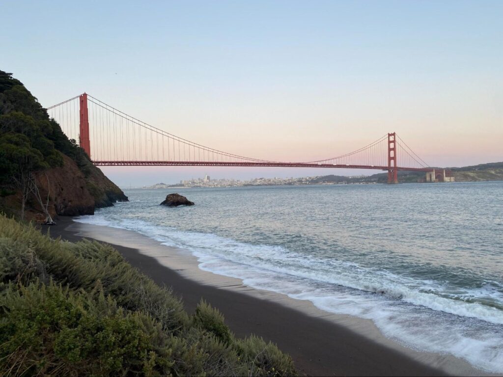 The Golden Gate Bridge at sunset viewed from Kirby Cove beach
