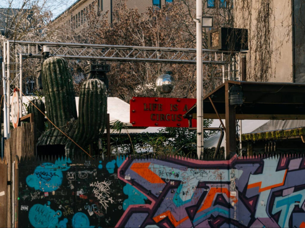 View of the murals around the KitKatClub at day-time