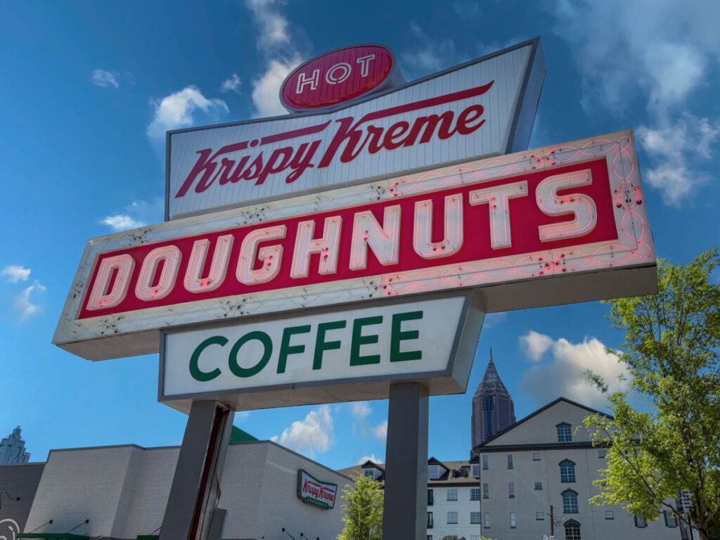 View of the famous Krispy Kreme retro sign on Ponce de Leon Ave