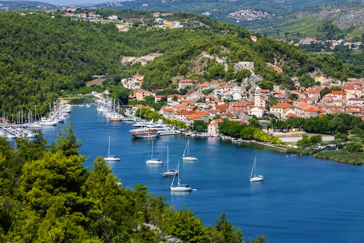 Summer landscape of the Croatian small town Skradin on Krka River near the Krka National Park