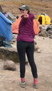 The author posing for a photo wearing her Kuhl Frost Soft Shell Pants