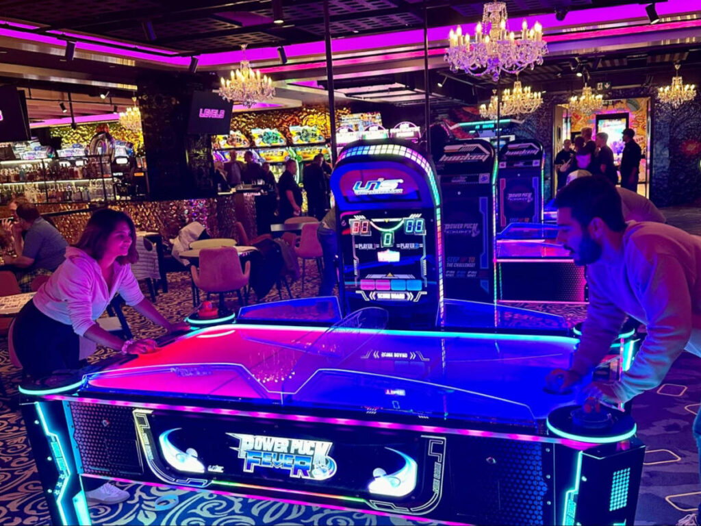 Author Meera and her partner playing a game at LEVELS Arcade Bar