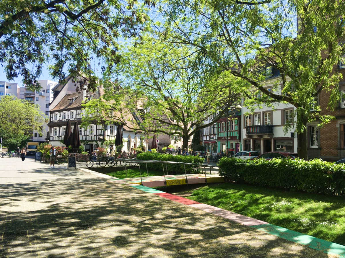 View of the buildings and the greenery at the street corner in La Bourse neighborhood