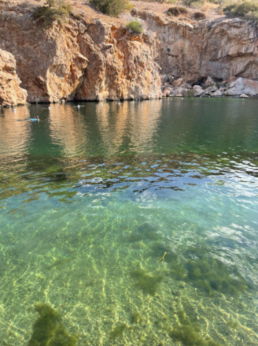 View of the clear water at the Lake Vouliagmeni