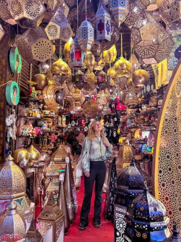 The author, Kate McMahon on a oriental lamp collection shop at the Shops at Khan-el-Khalili