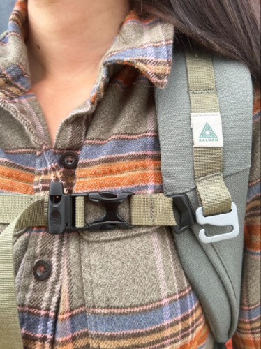 Close up view of the Salkan Carry-On Backpack shoulder strap with lash points and a G-hook
