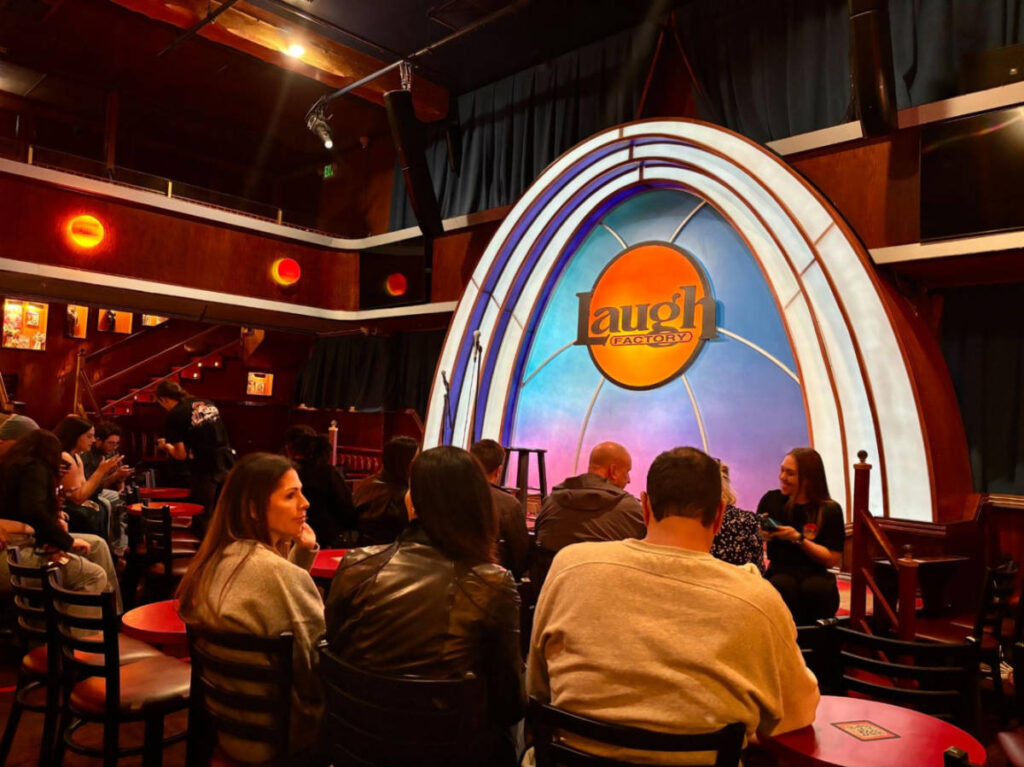 People enjoying inside the Laugh Factory