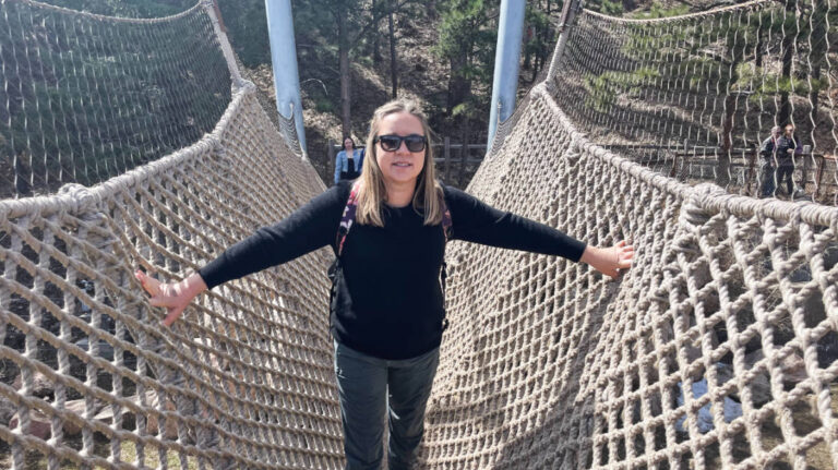 The author Laura Falin on an obstacle course
